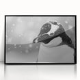 Framed wall art showcasing a black acrylic penguin design, set against a vibrant backdrop, perfect for animal lovers and modern decor enthusiasts.