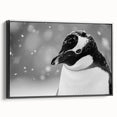 Framed canvas wall art featuring a black penguin design in a sleek side view, perfect for wildlife enthusiasts and modern decor. Ideal for adding sophistication to any space.