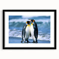 Framed black wall art featuring a whimsical penguin design in a modern aesthetic, perfect for animal lovers and stylish home decor accents.