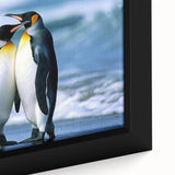 Close-up of a framed canvas wall art featuring a whimsical penguin design, set against a soft pastel background, perfect for animal lovers and modern decor enthusiasts.