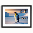 Penguin-themed wall art framed in black, showcasing a vibrant design of playful penguins against a crisp white background, perfect for children's rooms or animal lovers.