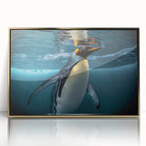 Framed acrylic wall art featuring a striking penguin design with gold accents, displayed in a modern setting, ideal for wildlife-themed decor.