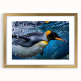 Framed wall art showcasing a whimsical penguin design in a gold frame with a mat, perfect for adding a playful touch to modern decor. Ideal for animal lovers.