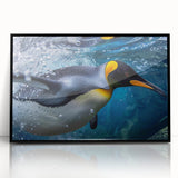 Framed acrylic wall art featuring a stylized penguin design in a sleek black frame, perfect for modern decor. Ideal for animal lovers and contemporary spaces.