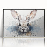 Framed wall art featuring a sleek rabbit design in acrylic with a silver frame, set against a neutral background, perfect for modern decor.