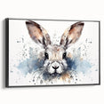 Framed wall art featuring a stylized rabbit design in a contemporary black frame, showcasing intricate details and vibrant colors, perfect for animal lovers and home decor enthusiasts.