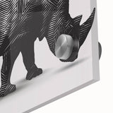 Close-up of a striking acrylic glass wall art piece featuring a detailed rhinoceros design, showcasing vibrant colors and intricate textures that enhance any wildlife-themed decor. Perfect for nature enthusiasts and animal lovers, this artwork adds a bold statement to interior spaces.