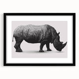 Black-framed wall art showcasing a striking rhinoceros design, set against a clean background, perfect for wildlife enthusiasts and modern home decor.