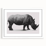 Framed wall art showcasing a striking rhinoceros design, featuring a white mat and sleek frame, perfect for enhancing modern decor and animal-themed interiors.