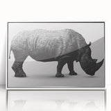 Framed acrylic wall art of a rhinoceros, showcasing detailed wildlife design in vibrant colors with a sleek white frame, perfect for animal lovers and home decor.