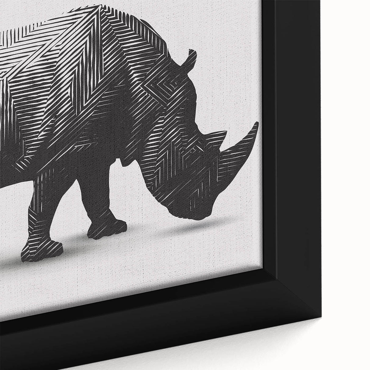 Close-up view of a framed canvas wall art featuring a detailed, artistic depiction of a rhinoceros in a wildlife setting, showcasing rich colors and textures.