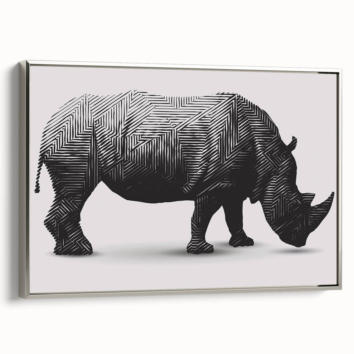Silver-framed wall art featuring a detailed side view of a rhinoceros in a natural setting, showcasing its textured skin and majestic form, perfect for wildlife enthusiasts.
