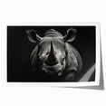 Rhinoceros-themed wall art print showcasing a vibrant, stylized depiction of a rhino in a natural habitat, ideal for wildlife enthusiasts and home decor.