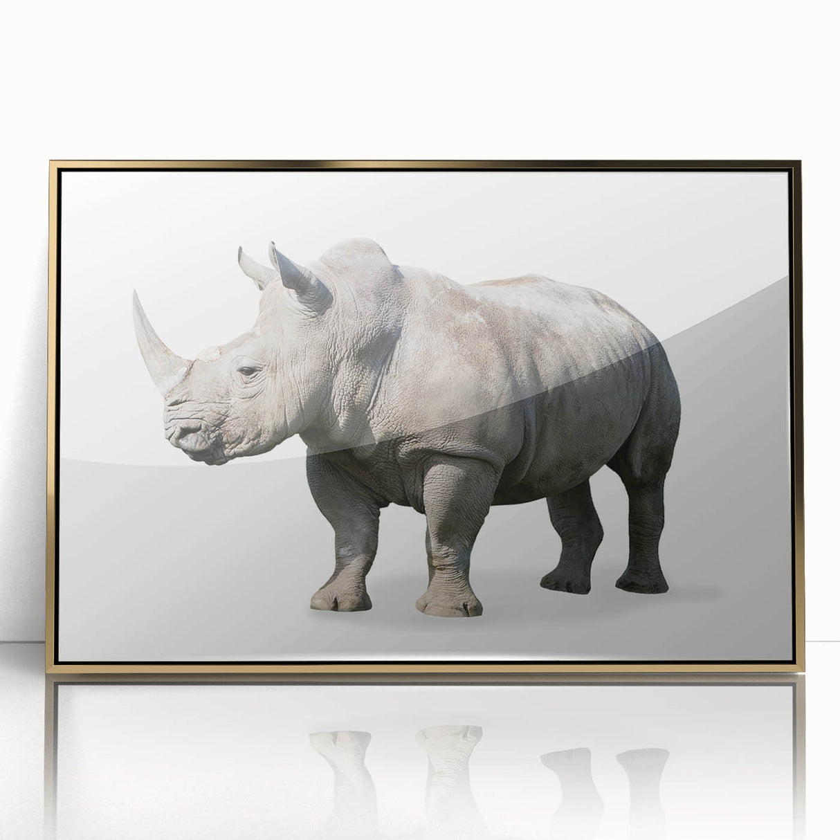Framed acrylic wall art showcasing a majestic rhinoceros design in a gold frame, highlighting its unique features and textures, perfect for wildlife enthusiasts.