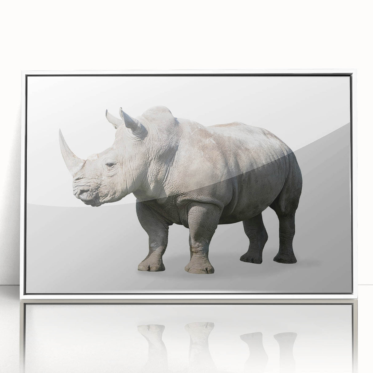 Framed wall art featuring a white acrylic design of a rhinoceros, showcasing detailed textures and vibrant colors, perfect for animal lovers and modern decor.