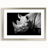 Front view of a framed wall art collection featuring a striking rhinoceros design with a silver mat, perfect for wildlife enthusiasts and modern decor.