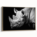 Framed wall art featuring a side view of a majestic rhinoceros in gold tones, showcasing intricate details against a neutral background, perfect for wildlife enthusiasts.