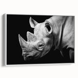 Framed wall art featuring a side view of a rhinoceros in a minimalist design, showcasing earthy tones and sleek lines, perfect for animal lovers and modern decor.