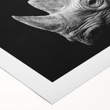 Rolled canvas print showcasing a striking rhinoceros design in vibrant colors, ideal for wildlife enthusiasts and modern decor, presented in a protective cardboard tube.