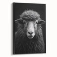 Framed wall art featuring a contemporary sheep design, showcasing intricate details and a sleek black frame, perfect for modern home decor. Ideal for animal lovers and art enthusiasts, this canvas adds a stylish touch to any interior space.