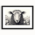 Black-framed wall art featuring a stylized sheep design from the "Animals A Wild Life" collection, set against a white mat, ideal for modern home decor.