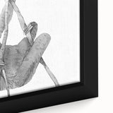 Close-up of a framed canvas wall art featuring a whimsical sloth design, showcasing vibrant colors and intricate details, perfect for animal lovers and home decor enthusiasts.