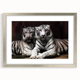 Framed wall art featuring a striking tiger design, showcased with a silver matte finish, perfect for adding a touch of wildlife elegance to home decor.