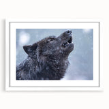 Wolf-themed wall art collection featuring a striking black and white design, framed with a white mat, ideal for nature lovers and home decor enthusiasts.