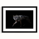 Framed wall art featuring a striking black and white wolf design with a mat, perfect for adding a touch of nature-inspired decor to any room.