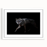 Framed wall art featuring a striking wolf design in a minimalist style, with a white mat and frame, perfect for nature-themed home decor. Ideal for animal lovers seeking to enhance their living space's aesthetic.