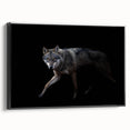 Framed canvas wall art featuring a striking wolf design, showcasing intricate details and a sleek black frame, ideal for wildlife enthusiasts and modern decor.