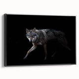 Framed canvas wall art featuring a striking wolf design, showcasing intricate details and a sleek black frame, ideal for wildlife enthusiasts and modern decor.