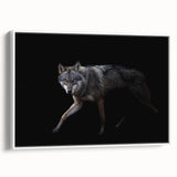Framed wall art featuring a striking wolf design in a natural setting, showcasing detailed fur textures and a white frame, perfect for wildlife enthusiasts.