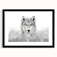 Framed wall art showcasing a striking wolf design in black and white, featuring a mat for an elegant finish, perfect for wildlife enthusiasts and home decor.