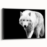 Framed canvas wall art showcasing a striking black and white wolf design, perfect for wildlife enthusiasts, set against a sleek black frame for a modern decor touch.