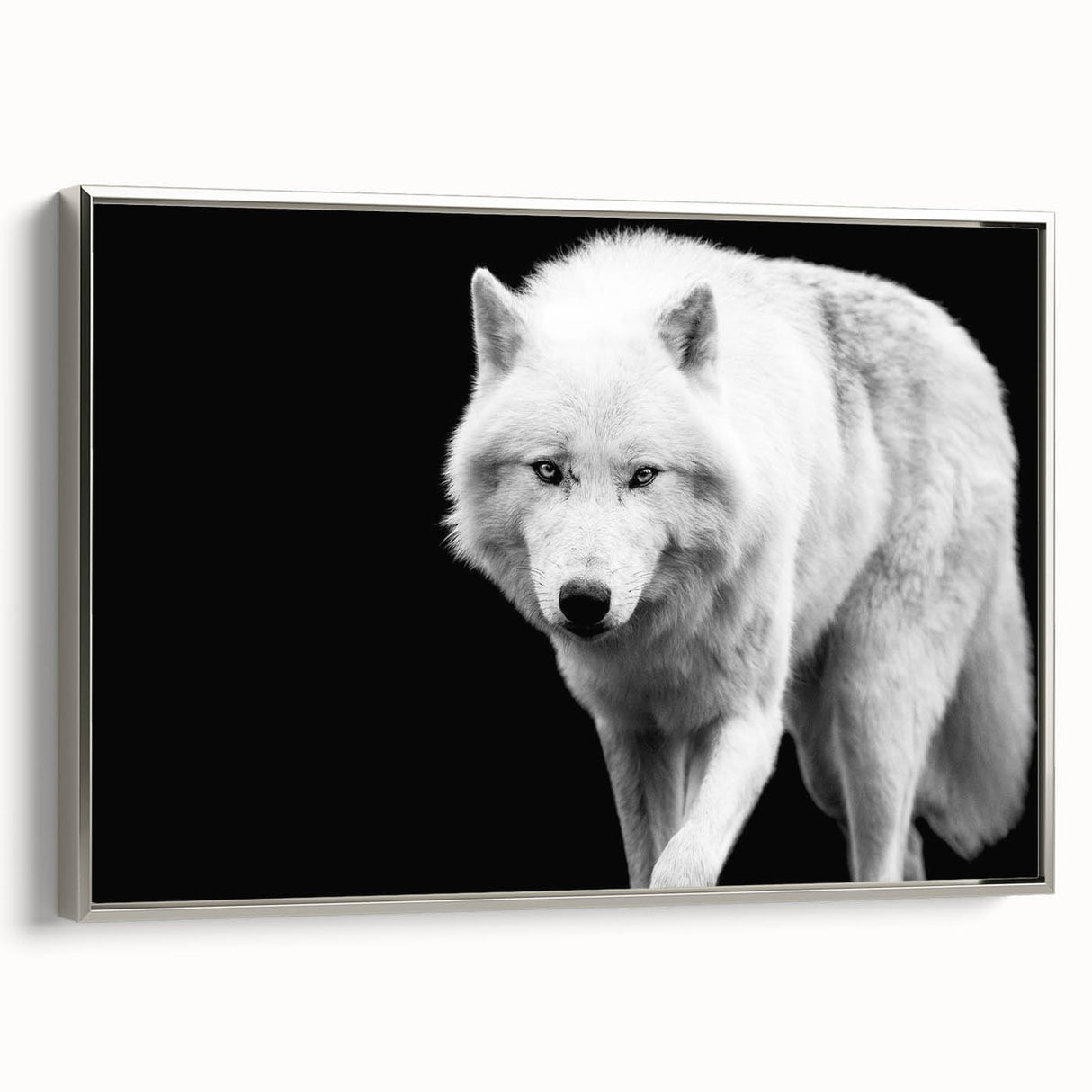 Framed wall art featuring a striking silver wolf design, showcasing intricate details and a sleek profile, perfect for wildlife enthusiasts and modern decor.