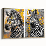 Framed canvas wall art showcasing a striking zebra design in black and white, accented with gold, ideal for modern home decor. Perfect for animal lovers and art enthusiasts.