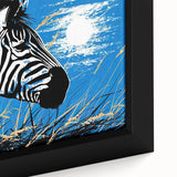 Close-up of a framed canvas wall art featuring a vibrant zebra design, showcasing intricate details and bold colors, ideal for wildlife-themed decor.