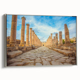 Vintage poster art of ancient ruins in muted earth tones on a large framed canvas, suitable for living room decor.