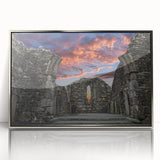 Mid-century modernist art depicting ancient ruins in muted earth tones on a framed acrylic print.