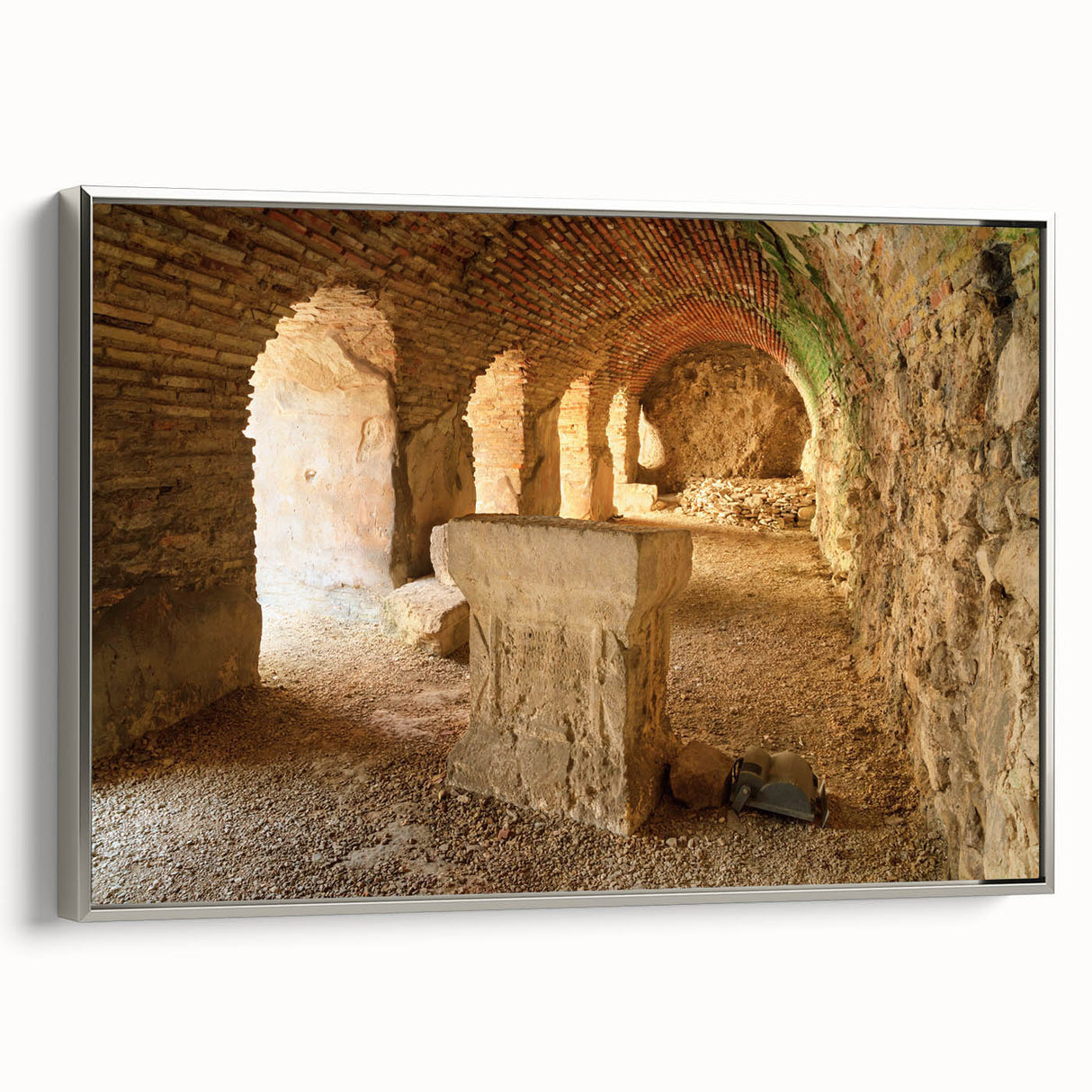 Framed canvas depicting ancient ruins in muted earth tones, ideal for adding a vintage touch to a study or office.