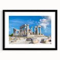Extra large abstract art print of colorful, textured ancient ruins on a black framed canvas, ideal for living room decor.