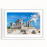 Abstract art print of ancient ruins in muted earth tones on a framed white mat, suitable for dining room decor.