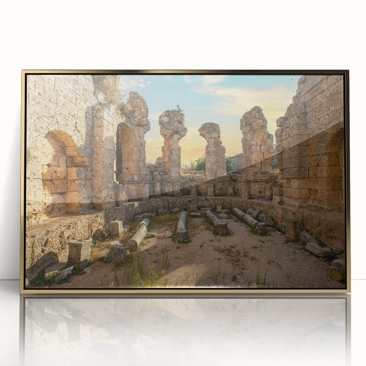 Mid-century modernist acrylic print of ancient ruins in gold frame, featuring muted earth tones.