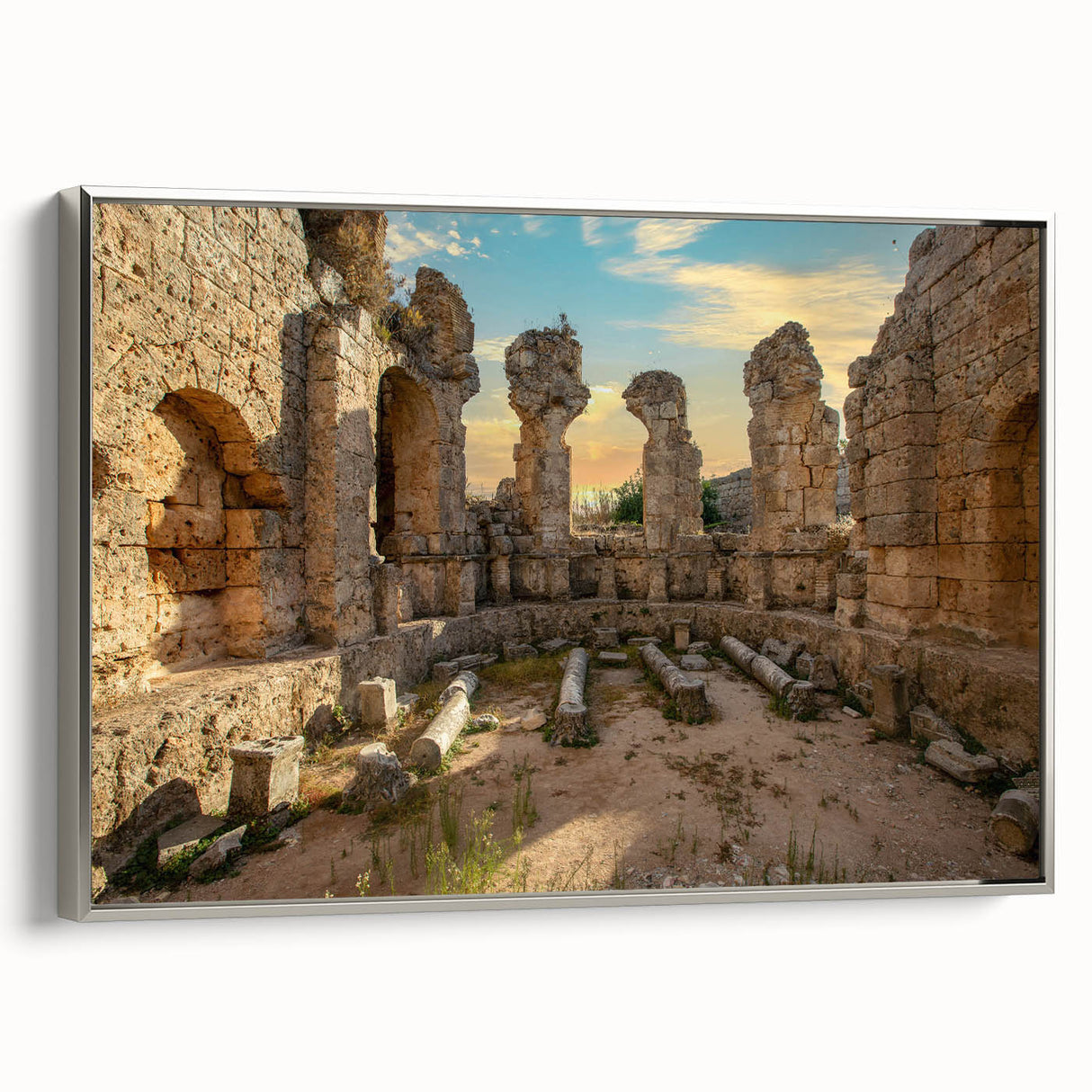 Vintage poster art of ancient ruins in muted earth tones on a large framed canvas, ideal for living room decor.