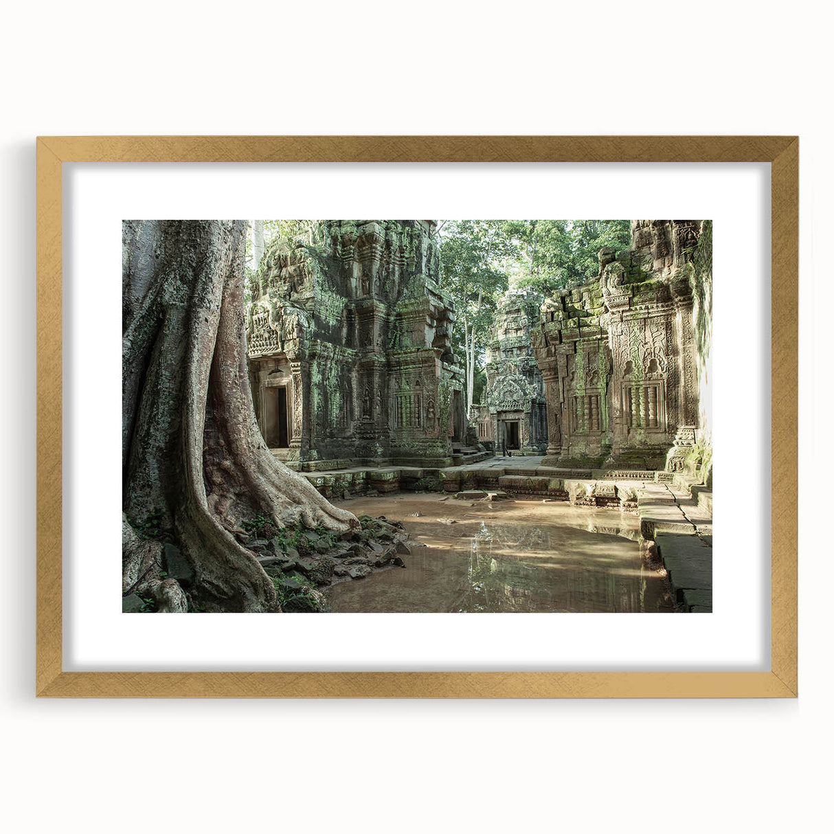 Abstract art print of ancient ruins in muted gold and beige tones, framed with a gold mat, suitable for dining room decor.