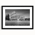 Extra large abstract art print of colorful ancient ruins on textured canvas, framed in black, suitable for living room decor.