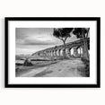 Extra large abstract art print featuring colorful, textured arches on a black framed canvas, ideal for living room decor.