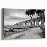 Framed canvas landscape art painting featuring colorful vintage poster art of black architectural arches.
