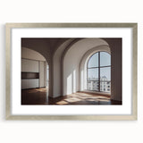 Textured art print featuring abstract arch designs in muted gray and silver, framed with a silver mat.